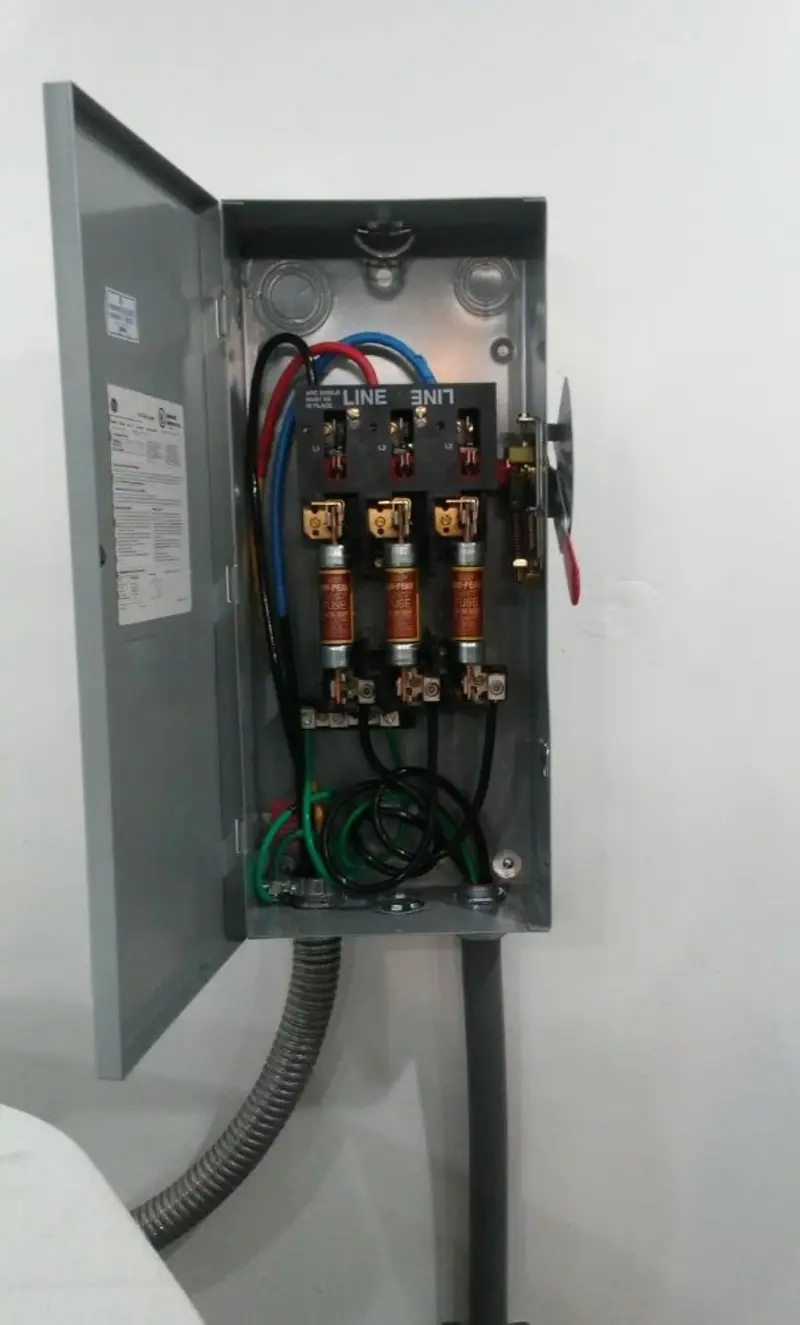 Three-phase disconnect switch installed for Smoke Detector Installation in Auburndale